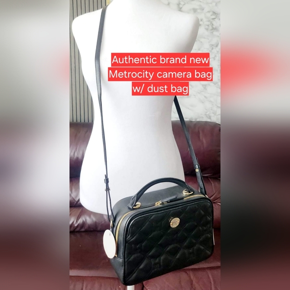 SOLD/Authentic Metrocity sling - Picture 1 of 1